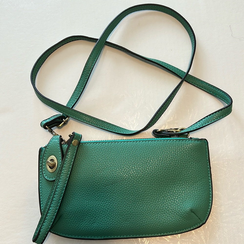 That green shoulder bag